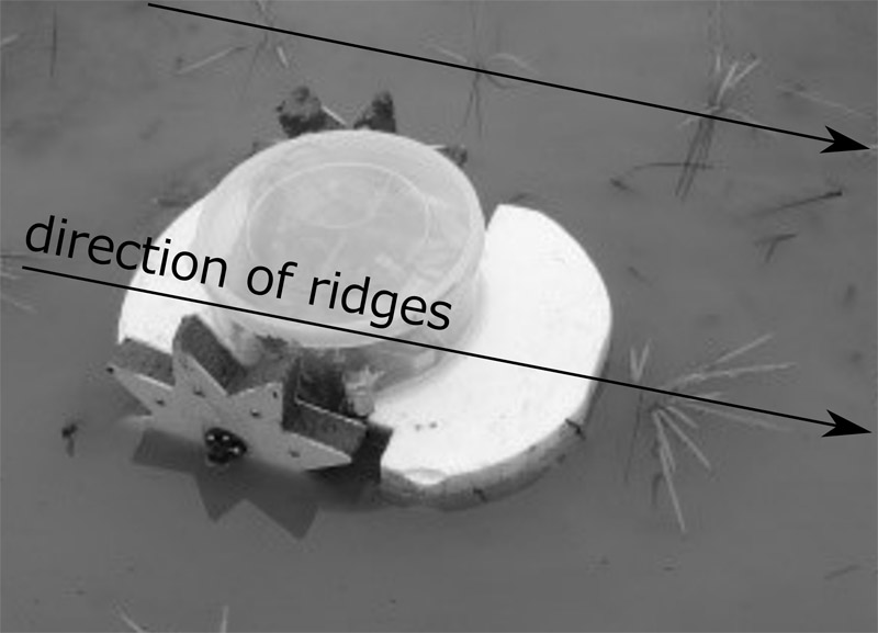 Example of stranding of a small paddy-field robot (riding over an underwater obstacle)