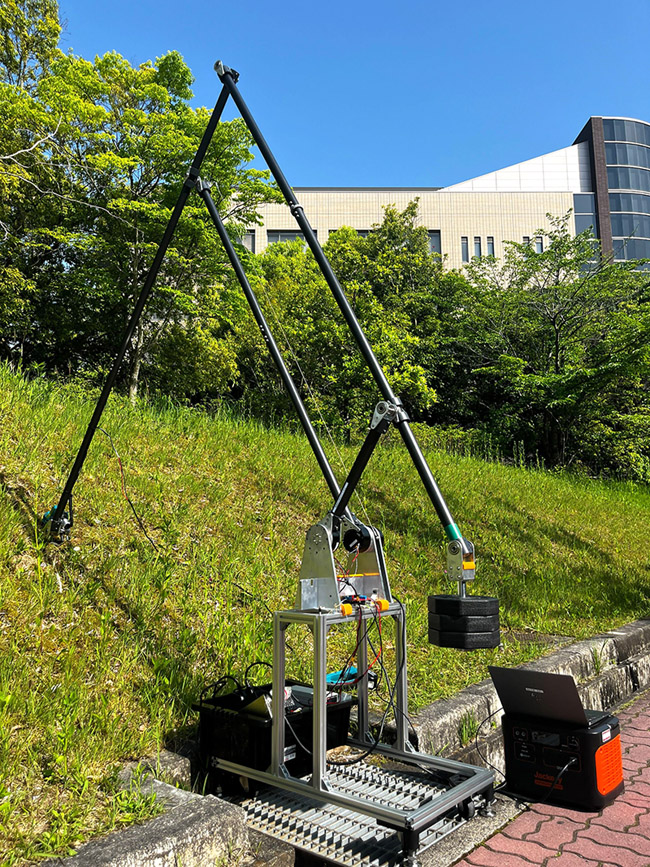 A lightweight long-reach outdoor robot arm for terrain-contact tasks