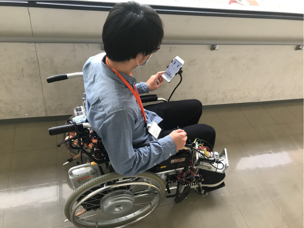 System integration of electric wheelchair and smart device based robot system