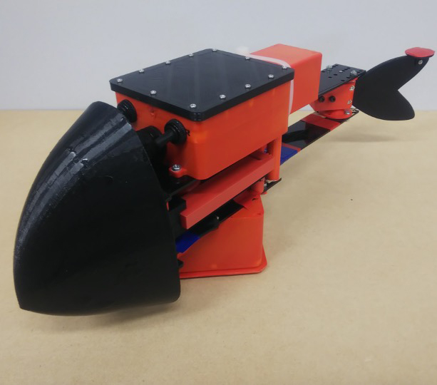 Fish-like robot with snap-through buckling