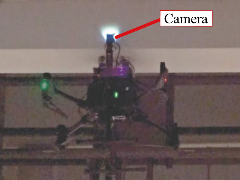 Inspection drone adsorbing on the steel beam
