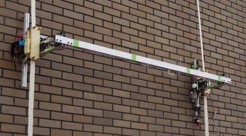 Image Mosaicking and Localization Using a Camera Mounted on a Hanging-Type Wall Climbing Robot