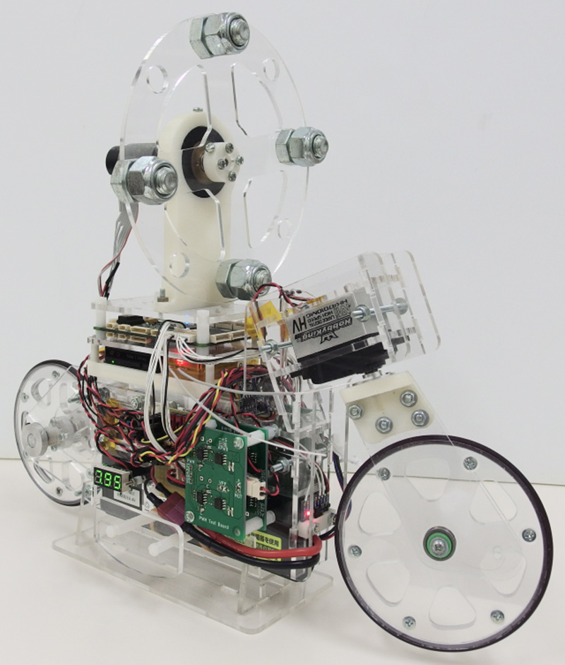 A Balance Control for the Miniature Motorcycle Robot with Inertial Rotor and Steering