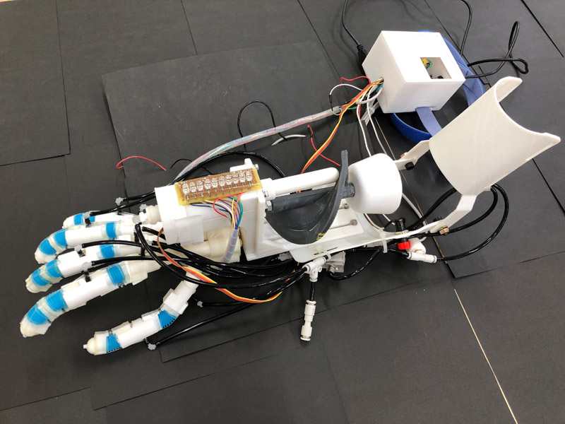 Self-powered hand prosthesis