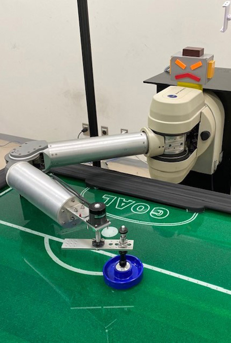 Development of Air Hockey Robot with High-Speed Vision and High-Speed Wrist