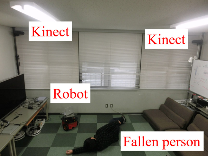 Monitoring System Using Ceiling Camera and Mobile Robot