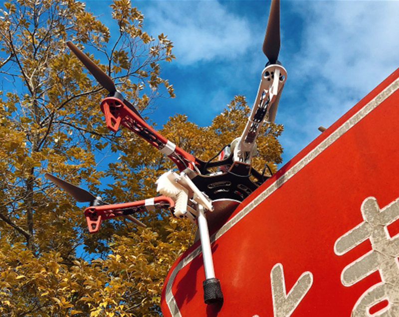 UAV perching on a thin board using passively driven perching mechanism