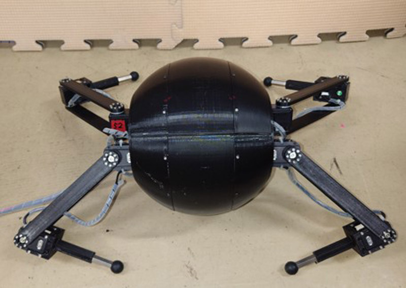 Quadruped robot with spherical body