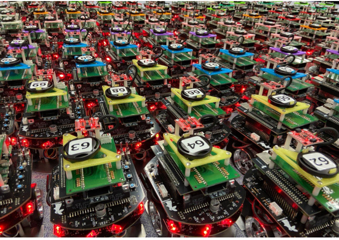 Fleet of 100 differential-drive robots for large-scale experiments